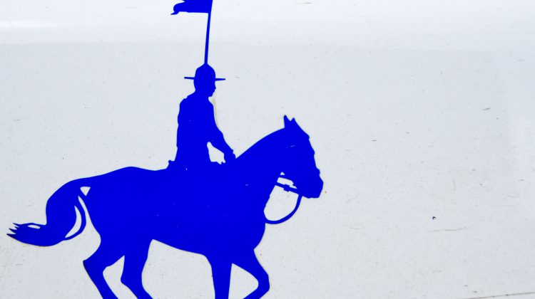 A logo of the RCMP on a police cruiser. Photo by James Wood/106.1 The Goat/Vista Radio