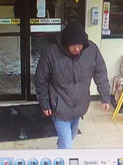 Robbery suspect caught on business surveillance footage