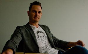 Mayoral candidate Jason Whiting is pictured in the offices of The Goat. Photo by James Wood/106.1 The Goat/Vista Radio
