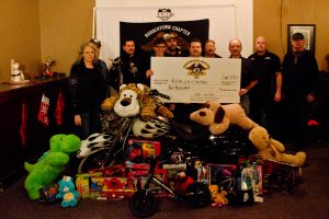 Real Country 95.9's Gift of Christmas received $2000, plus donated toys. . Photo by James Wood/106.1 The Goat/Vista Radio 