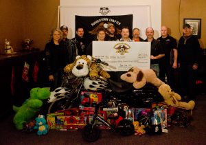 Big Brother's and Big Sister's recieved $19,328.34, plus donated toys. Photo by James Wood/106.1 The Goat/Vista Radio 