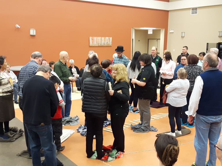 Blanket ceremony teaching the history of indigenous peoples in Canada