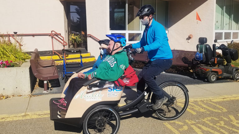 United Way pedals for trishaw volunteers roster