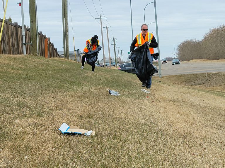 R&D Plumbing staff pitch in for 12 street clean up