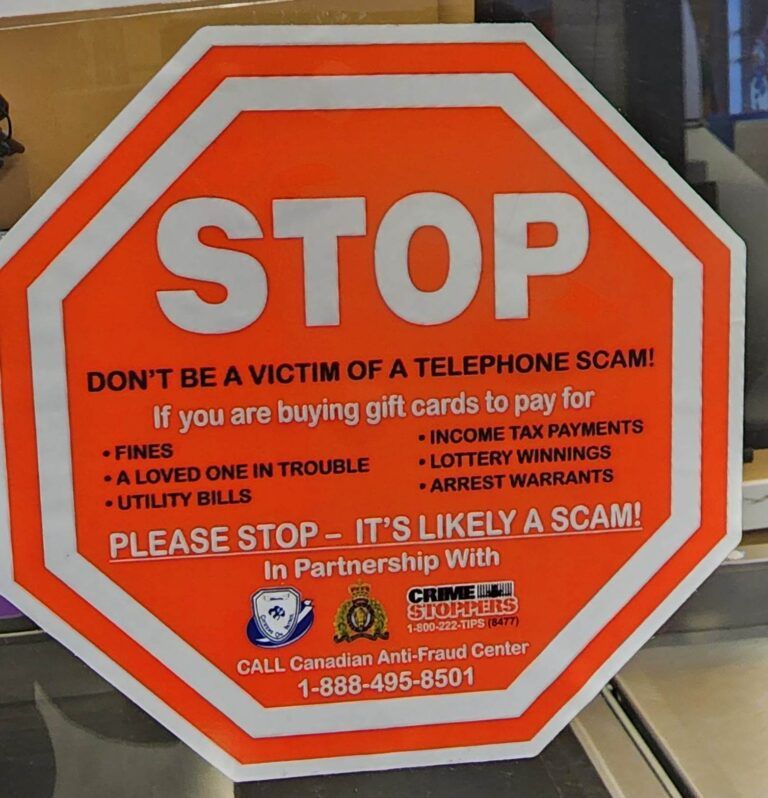 Scammer advisory stickers now at local businesses