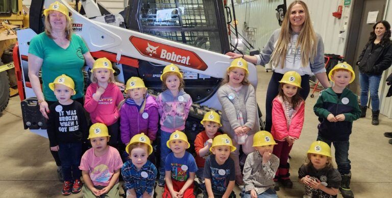 Play schoolers tour construction workshop
