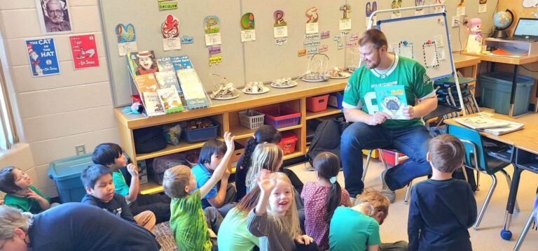 Jack Kemp shows off Rider reading pride
