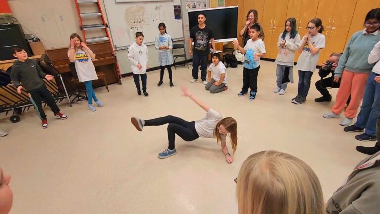 Jack Kemp students bust a move in breakdance class