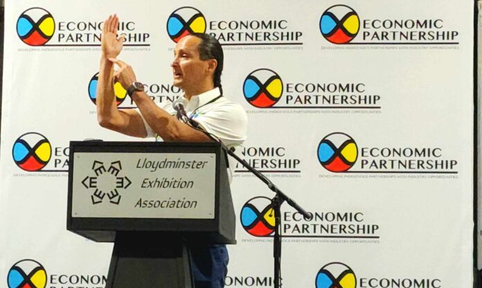 Keynote speaker Cadmus Delorme at the 2024 Economic Partnership Summit in Lloydminster. [Photo: Gerry Lampow 106.1 The Goat/Vista Radio]