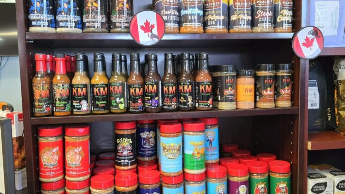 Kenny Mac's passion for hot flavours, salt, pepper and garlic blend, and a brisket rub is occupying prime space on the grocery shelf. Photo: Gerry Lampow 106.1 The Goat/Vista Radio.