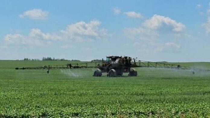 FILE: Crop spraying. | Photo: Gerry Lampow 106.1 the Goat/Vista Radio.