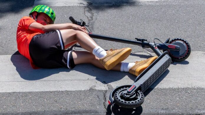 E-scooter rider falls on the sidewalk. | Photo credit: Town of Castle Rock Police Dept., Colorado, social media.