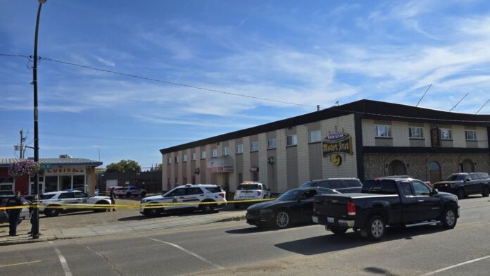 Police search for suspect following a fatal shooting in downtown Lloydminster. | Photo: 106.1 The Goat/Vista Radio.